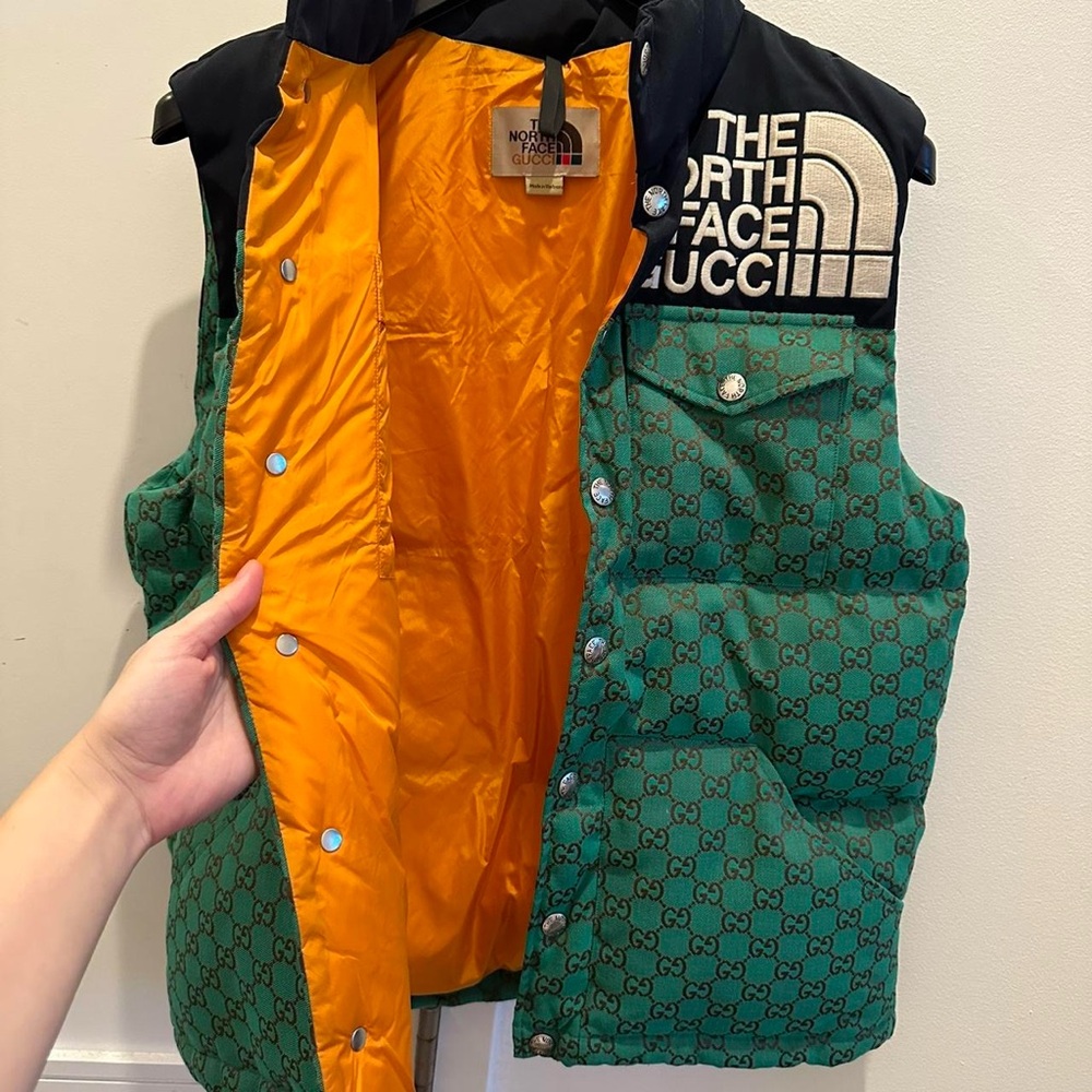 North Face X Gucci puffer vest with monogram design. Size XL, hardly worn.